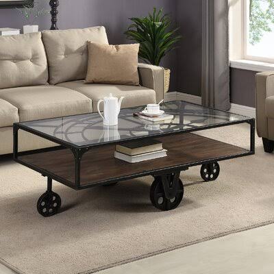 Beil Wheel Coffee Table with Storage 17 Stories NQL0_C9OED16